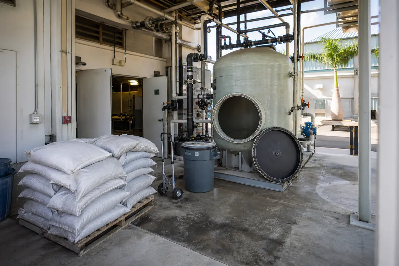 Illustration of commercial activated-carbon media replacement in a treatment vessel